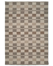 Rectangular area rug with a woven checkered pattern in neutral shades of beige, tan, and dark brown.