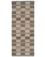 Rectangular area rug with a woven wool checkered pattern in neutral beige and dark brown tones.
