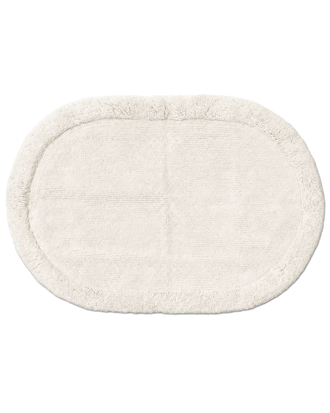 Badrumsmatta Border Oval Vit från Classic Collection, oval matta i bomull med mjuk lugg och dekorativ bård, 60x90 cm.