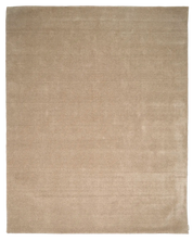 Handvävd luggmatta Lodge i ull, färgen Natural Beige, från Classic Collection. Enfärgad matta med mjuk melering och tät lugg.