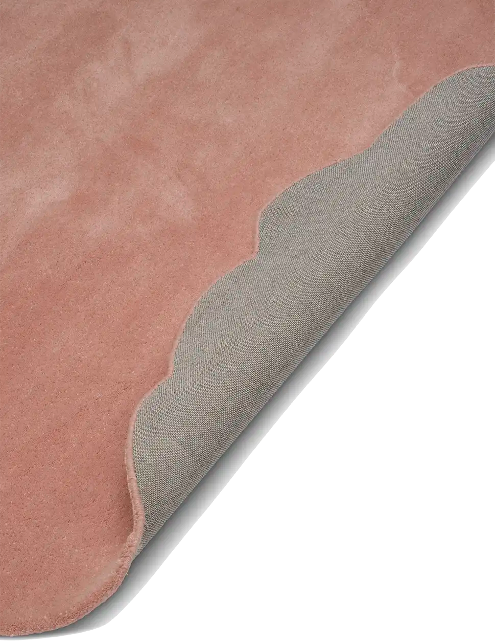 Ullmatta Shell Rosa med vågformad kant. Detaljbild av uppvikt hörn.