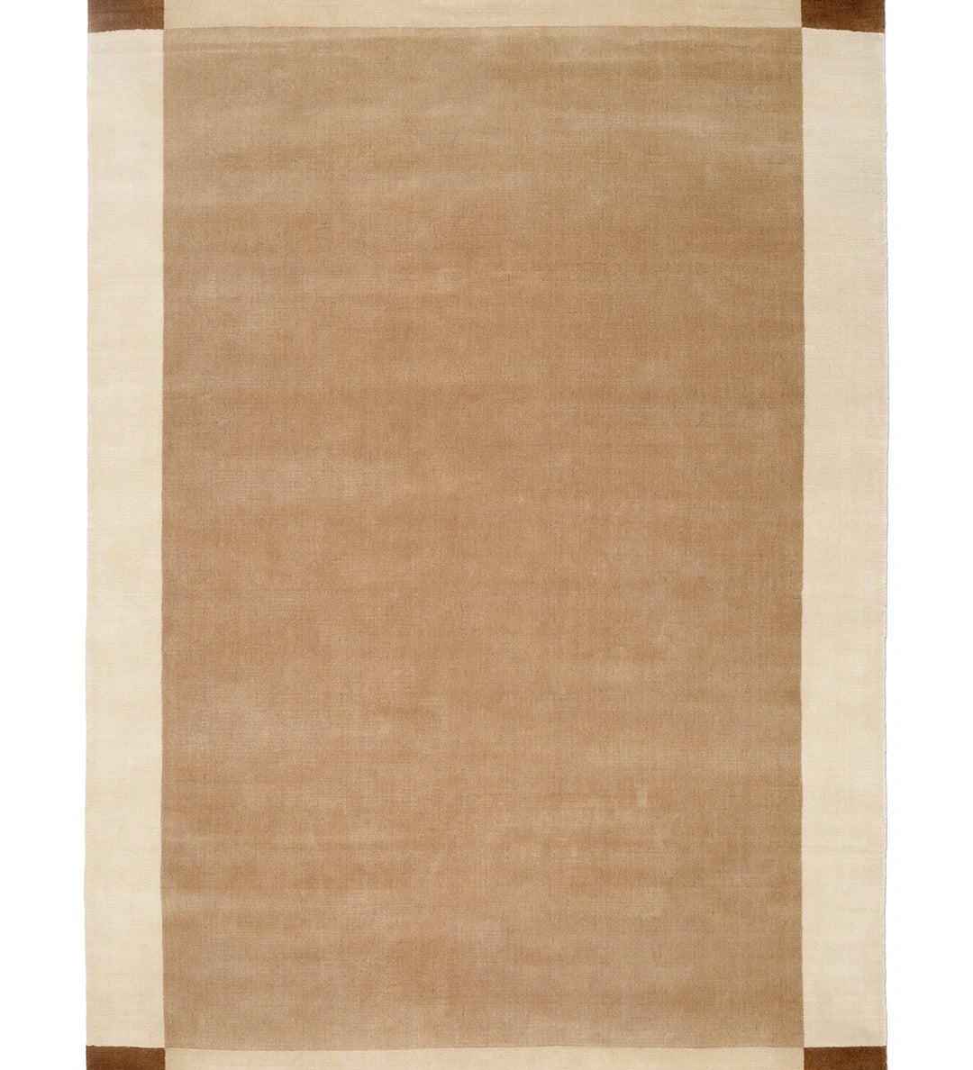 Signature Frame luggmatta sedd ovanifrån, med beige mittfält, naturvit ram och markerade hörn i brun ton.