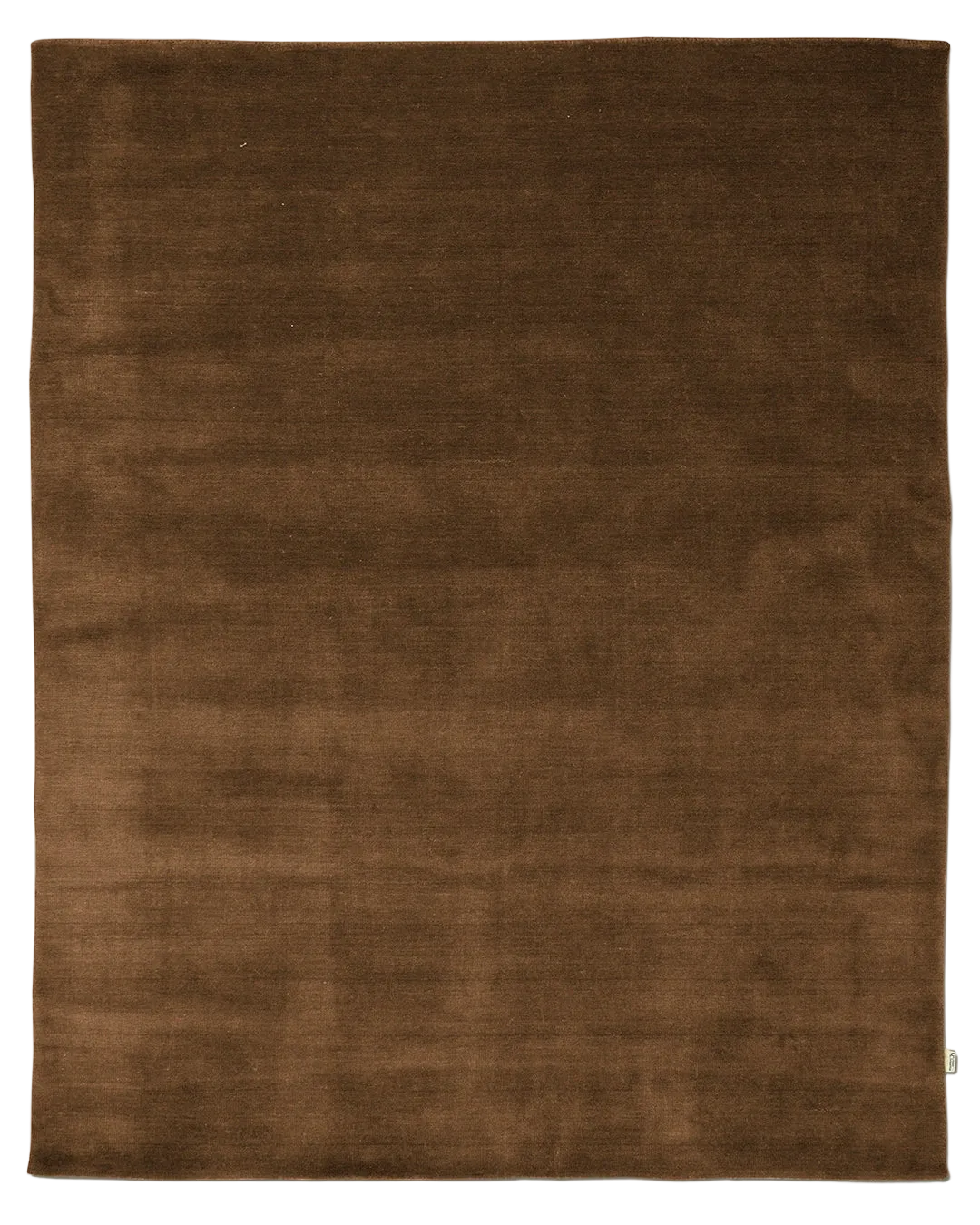 Frilagd bild av rostäfrgad matta Solid, enfärgad luggmatta.