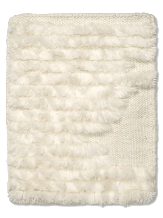 Cream-colored rectangular woven wall hanging with a plush, textured shag wool pattern and a solid knit border.