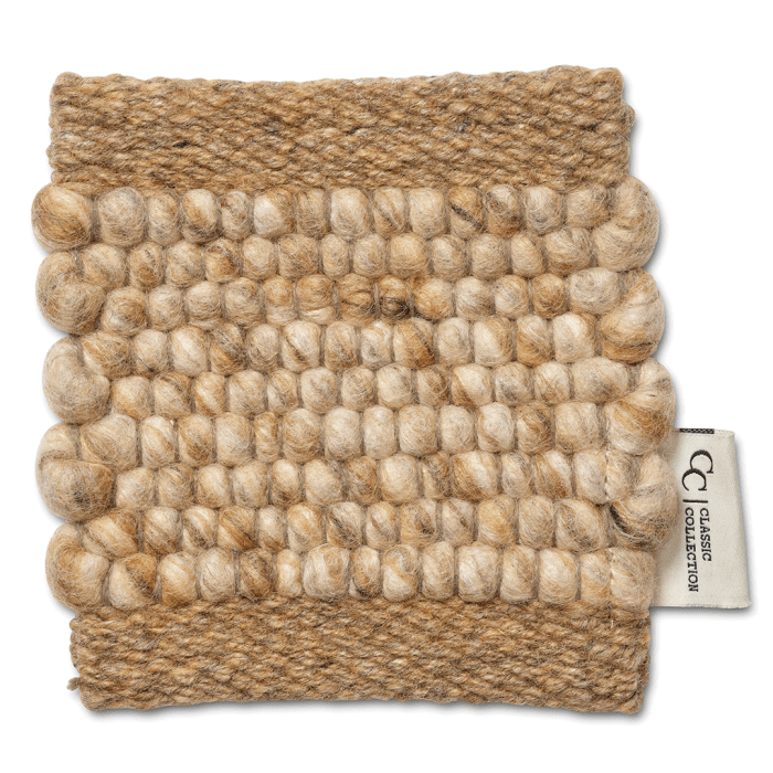 Square wool rug sample in beige with textured bubble pattern and woven border, Classic Collection tag on the side.