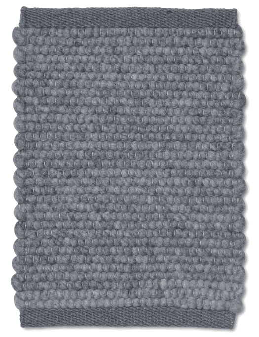 Rectangular grey wool area rug featuring a textured, felted ball pattern with solid woven border edges.