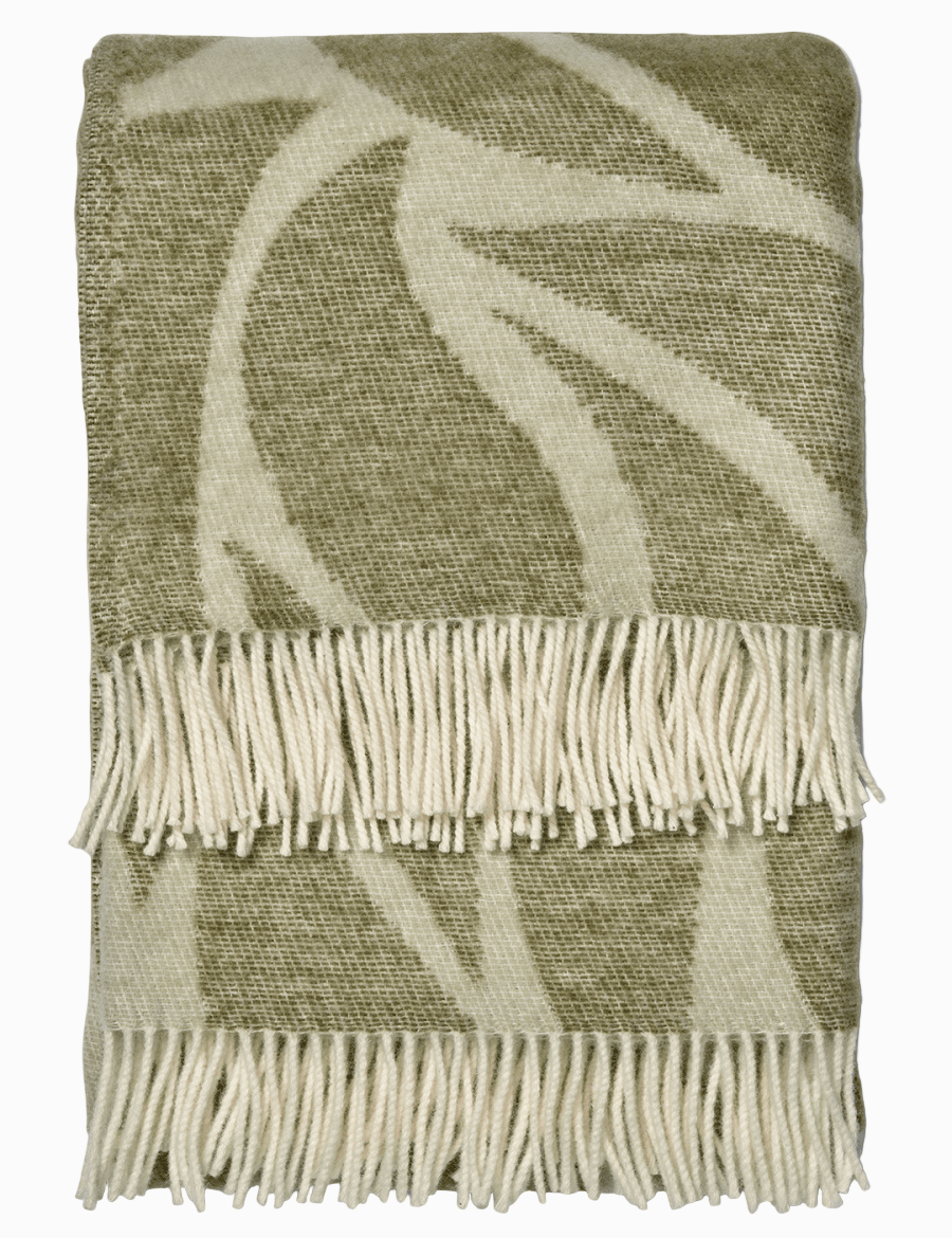 Pläd Folia Grön med fransar, hopvikt detalj