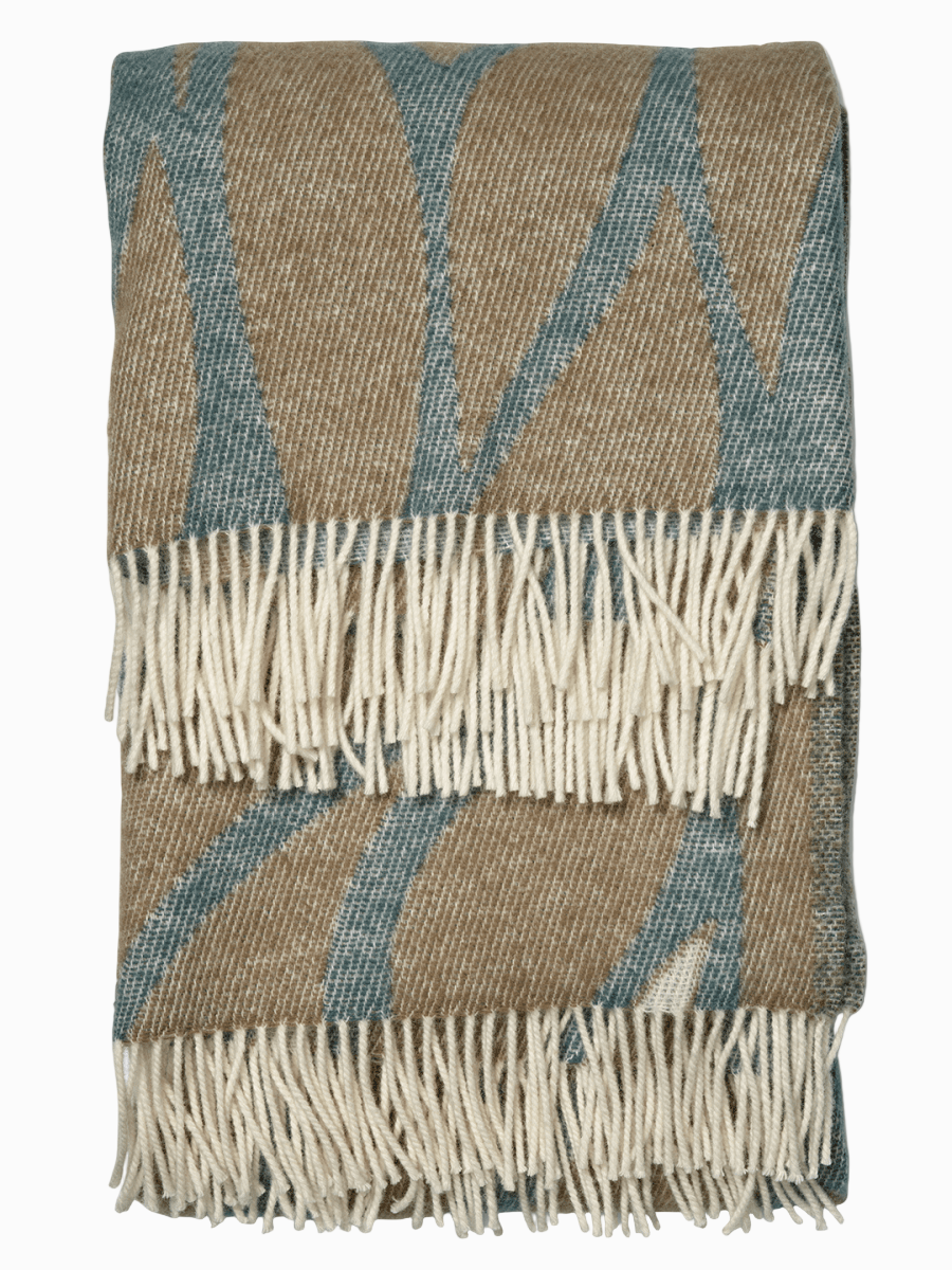 Pläd Leaf Teal fransar, hopvikt detalj