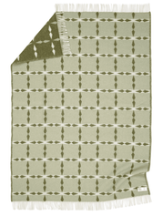 Frilagd pläd Tile Grön i nyzeeländsk ull, helt utfälld med synligt mönster.