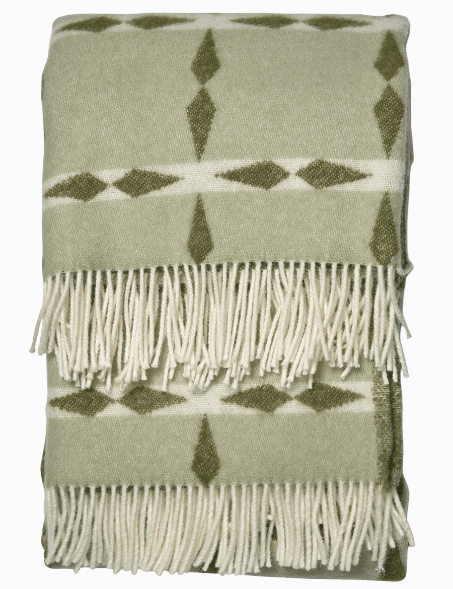 Frilagd pläd Tile Grön i nyzeeländsk ull, vikt med synlig franskant.