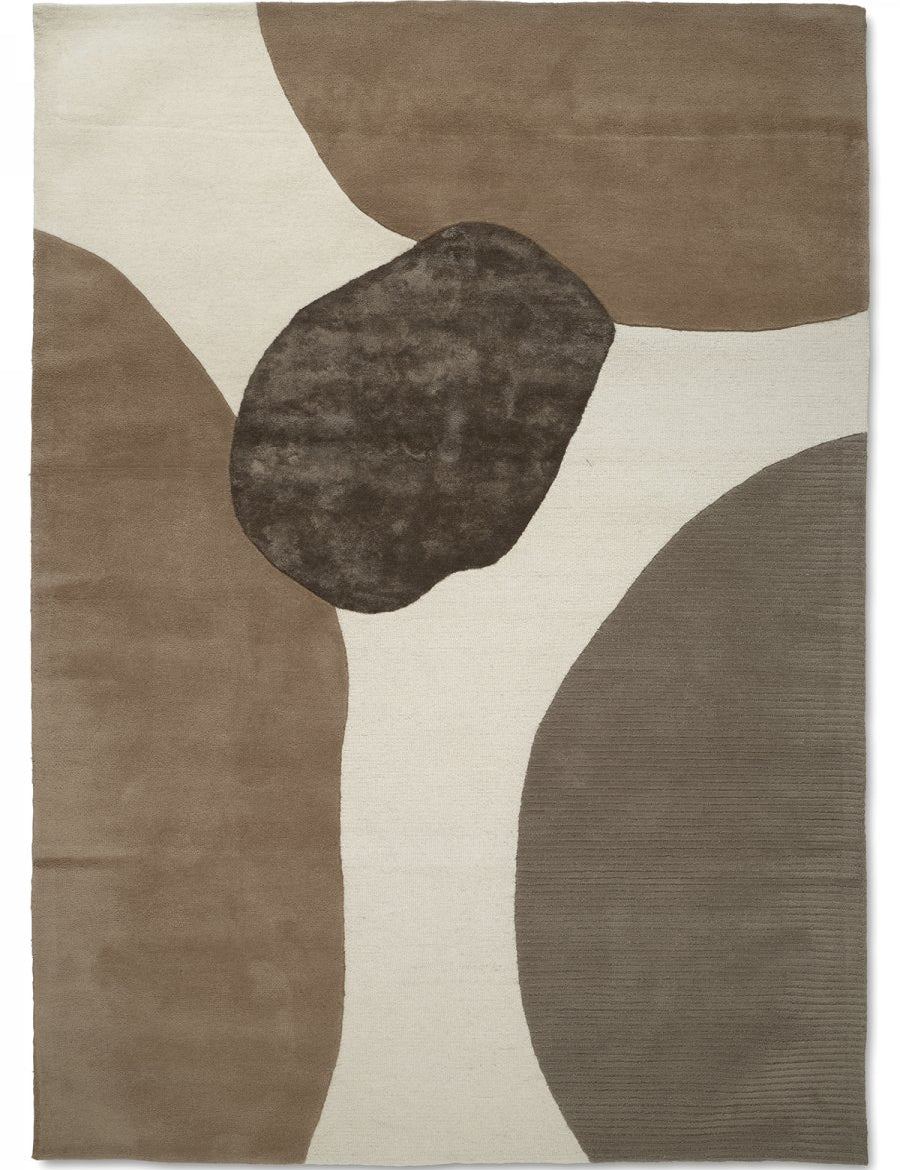 Modern area rug featuring an abstract, organic shape pattern in shades of cream, taupe, and dark chocolate brown.